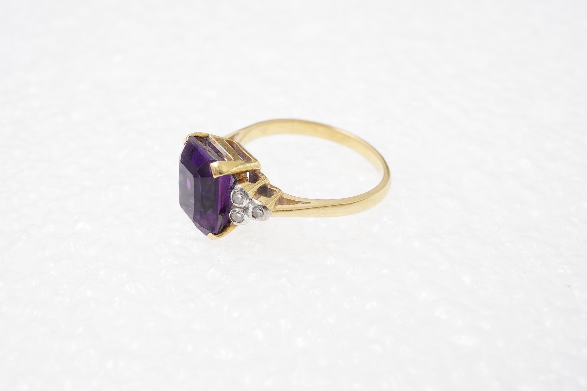 An amethyst and diamond ring